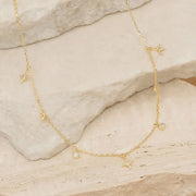 BATHED IN YOUR LIGHT CHOKER - GOLD